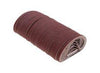 A roll of brown sharpening bands for knife cutting machines.