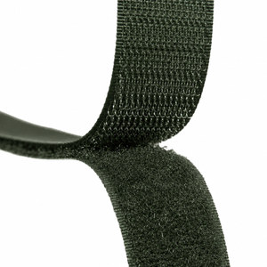 Close-up of a dark olive green hook-and-loop fastening strap on a plain white background.